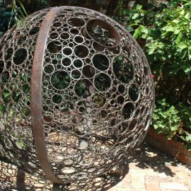 Metal ball sculpture at IGA in Rutherglen