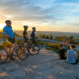 Cyclists enjoying the sunset view on top of Mt Pilot, Chiltern